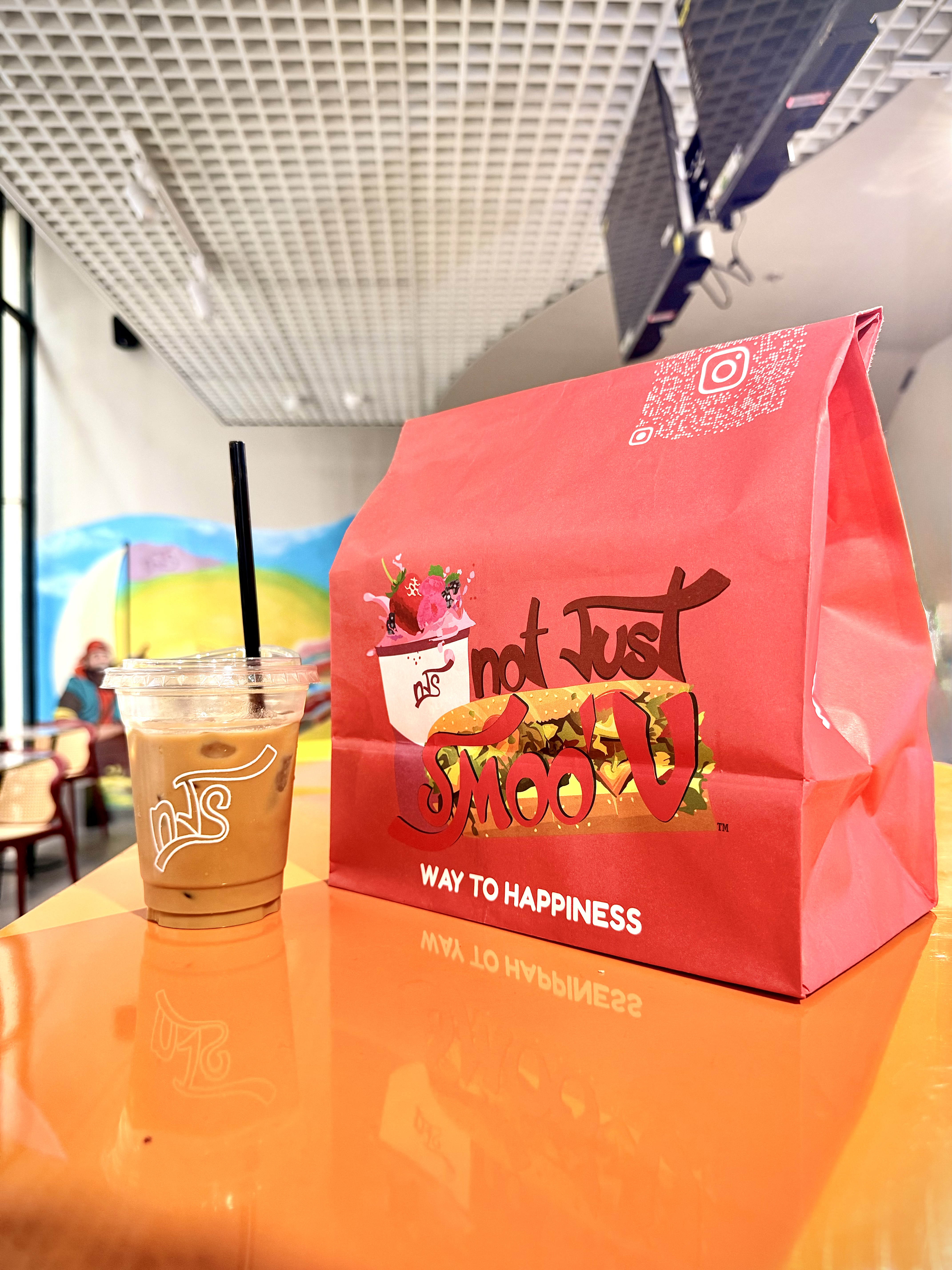 Way to happiness — an NJS takeaway bag and iced blend