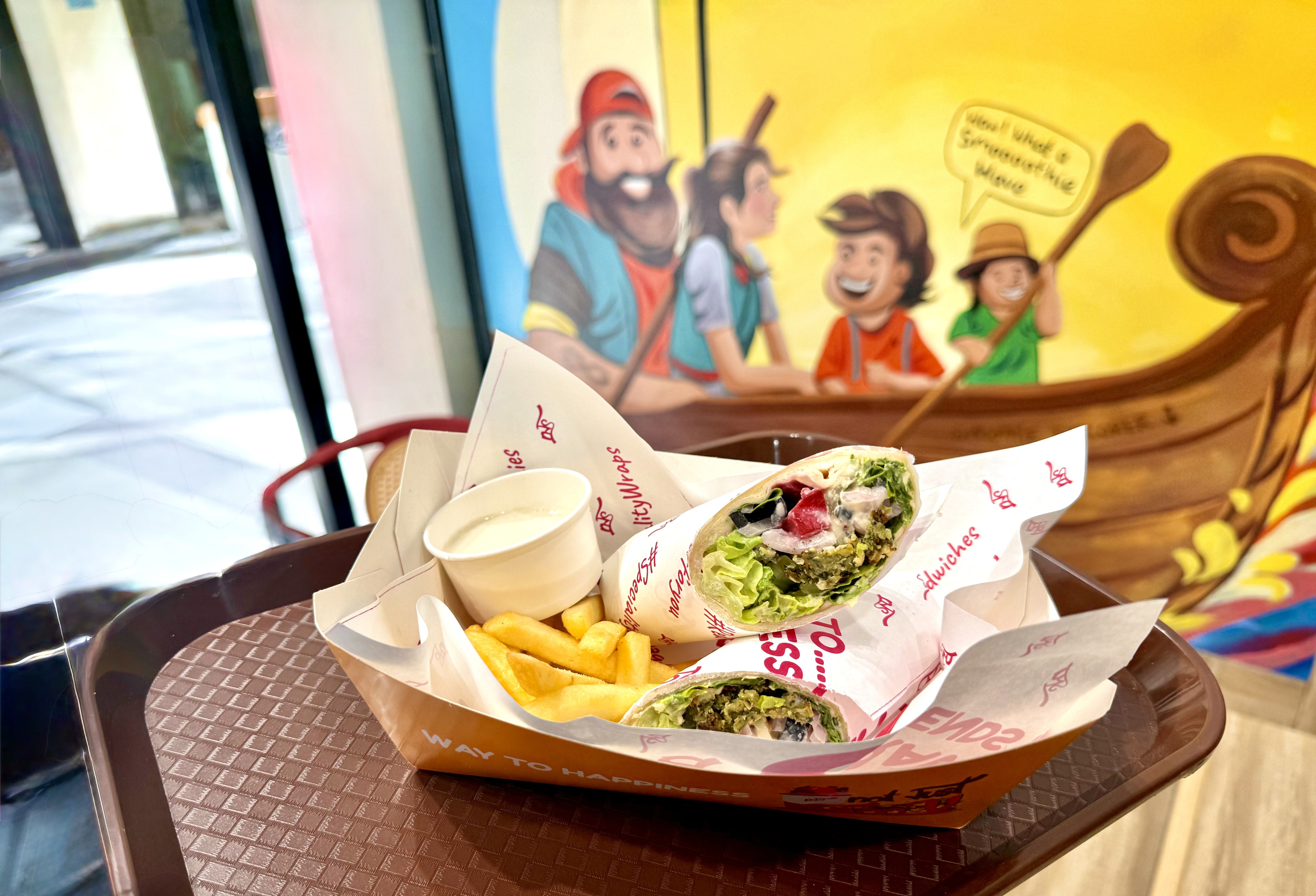 Downtown Beirut Falafel — Tahina sauce, hummus, cucumber, olives.